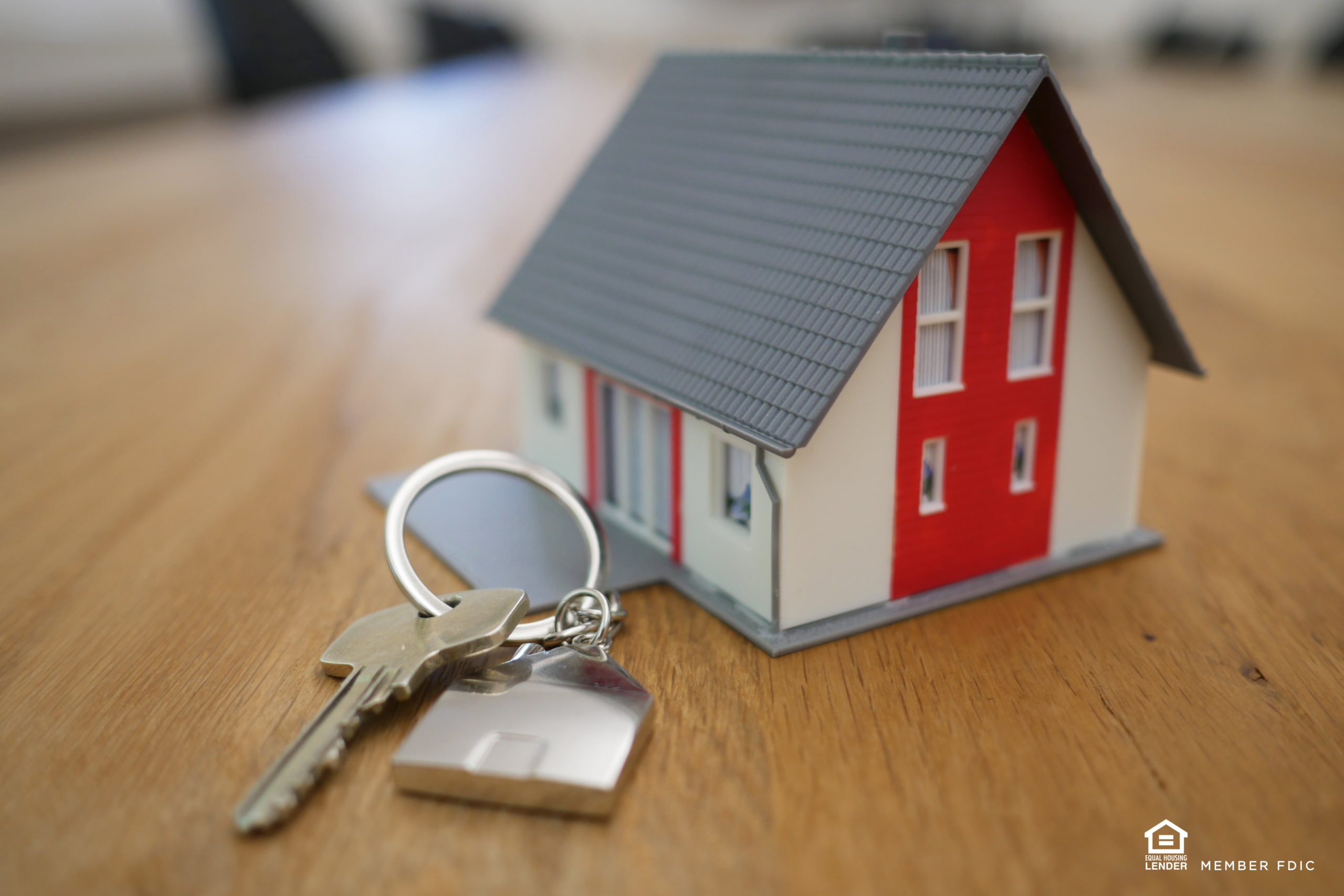 miniature replica of a house and set of keys