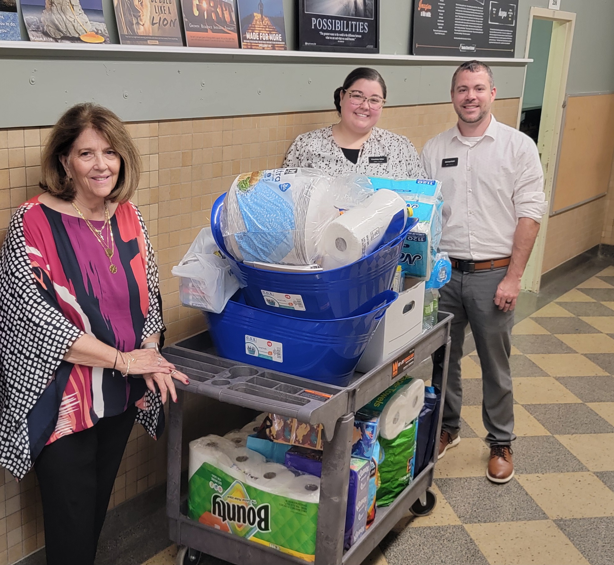 Core Bank employees delivering school supplies to Omaha Street School