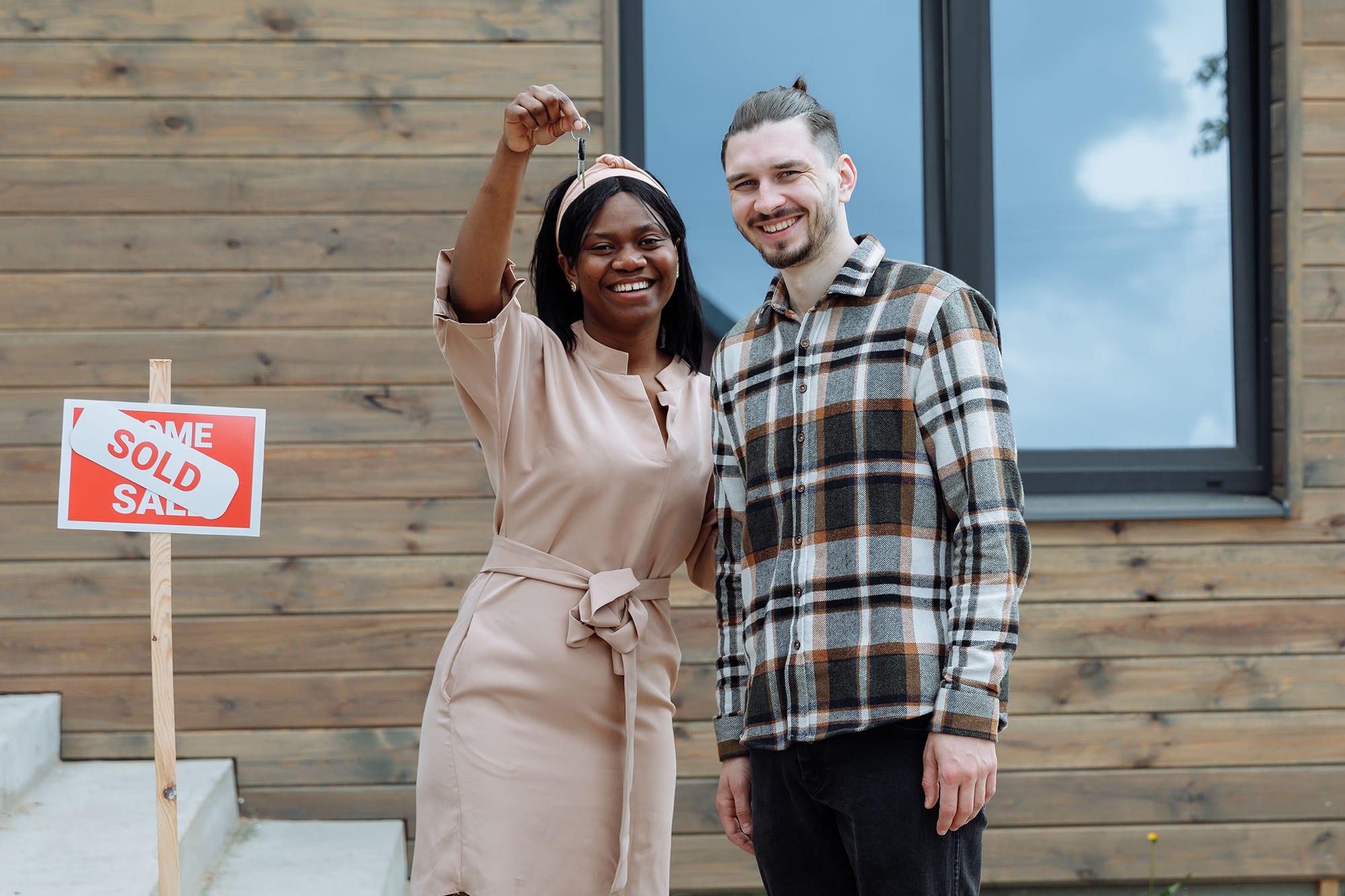 couple buys a house